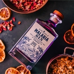 Tienda Crypto y Malaria Gin realizaron alianza para la venta con criptomonedas